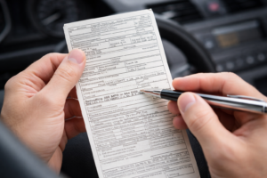 Driver reviewing traffic citation details for Austin speeding ticket dismissal process